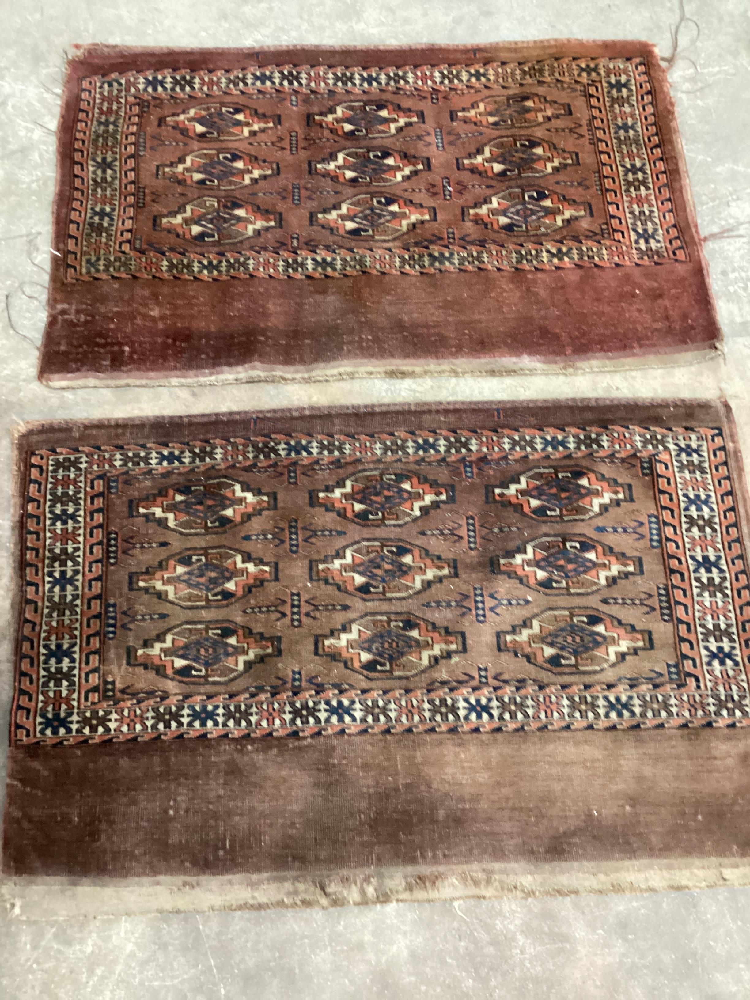 A pair of antique Turkoman red ground bags, 118 x 76cm